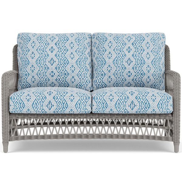 Mackinac Wicker Loveseat in Putty/Aman Capri by Lloyd Flanders