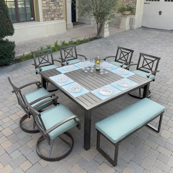 Atlantis 8 Pc Aluminum Dining Set w/ 6 Swivel Rocker Dining Arm Chairs & Two Person Bench in Walnut/Spa by Darlee